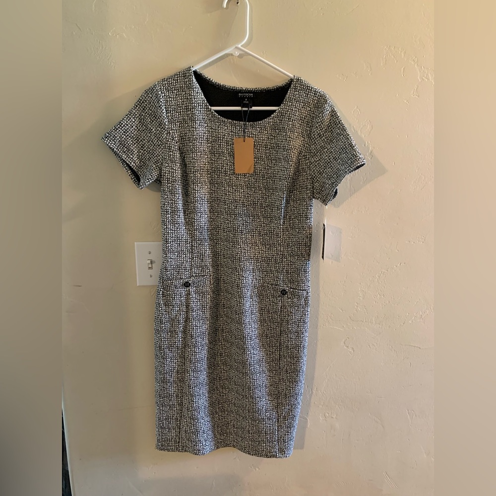 New with tags. Cute black and white En Focus dress.